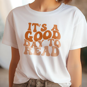 Camiseta Laranja É Um Bom Dia para Ler Livro