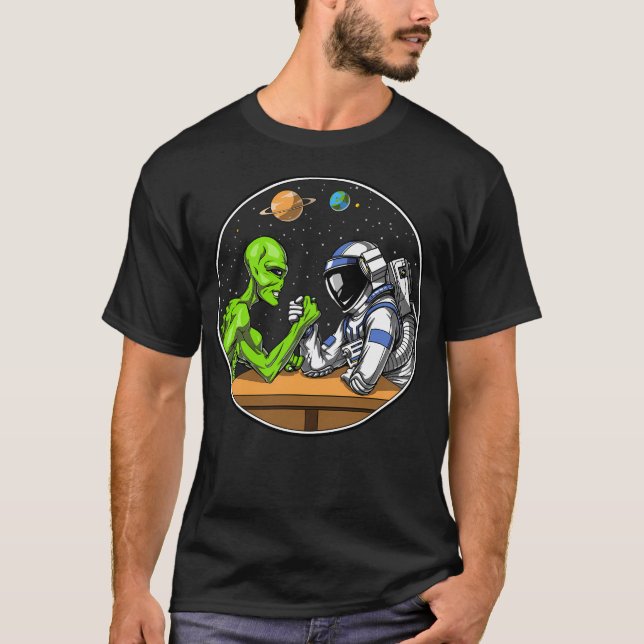 Camiseta Luta do braço da Alienígena astronauta (Frente)