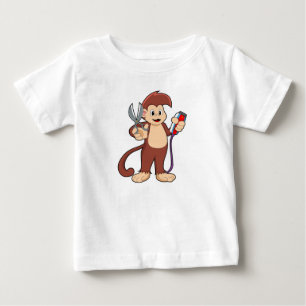 Camiseta Macaco como cabeleireiro com tesoura e Razor