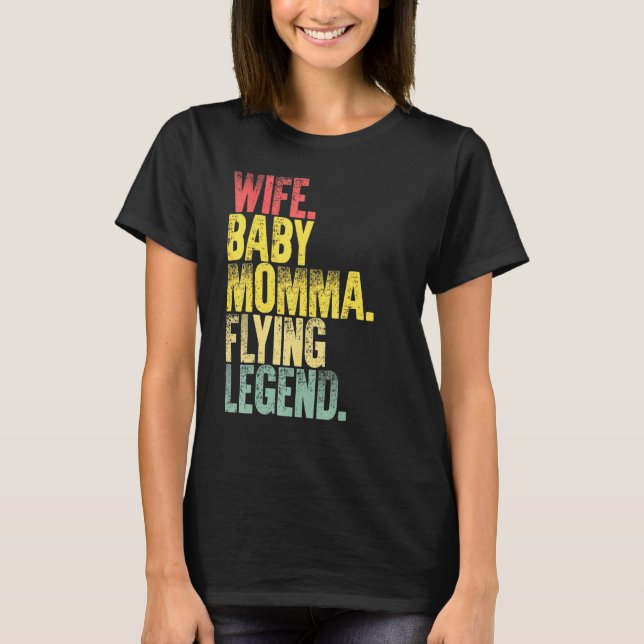 Camiseta Mãe Mulher Esposa Bebê Mãe Lenda Voadora (Frente)