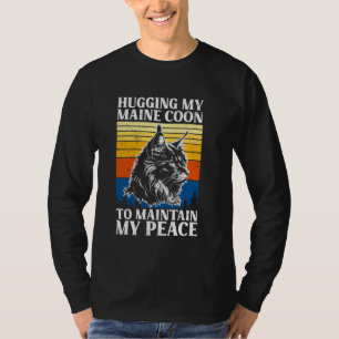 Camiseta Maine Coon a abraçar o meu capô para manter a paz