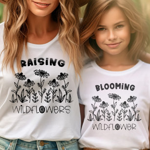 Camiseta Mamãe Branca de Flor Selvagem Negra-Vazio