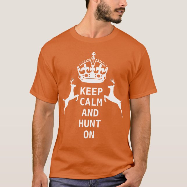 CAMISETA MANTENHA A CALMA E A CAÇA LIGADA (Frente)
