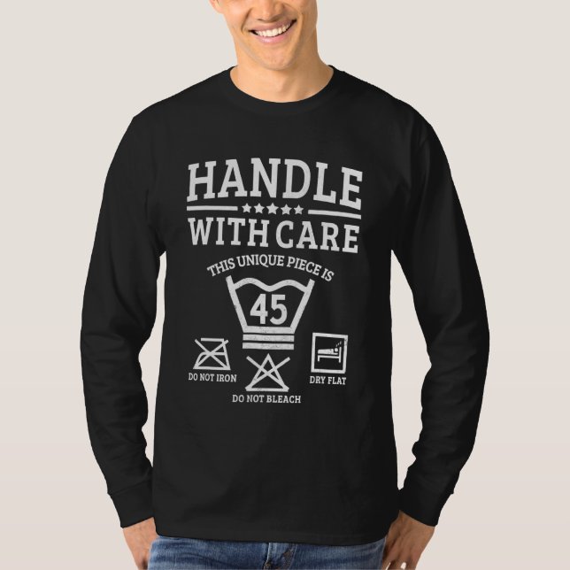Camiseta Manuseie com cuidado 45 Instruções de Lavagem 45º  (Frente)