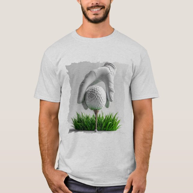 Camiseta Mão Enluvada Colocando Bola de Golfe em Tee com Gr (Frente)