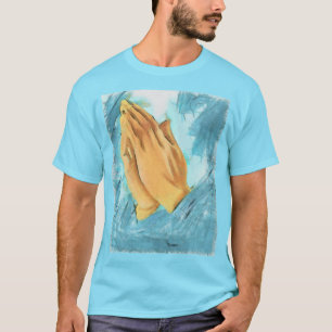 Camiseta Mãos de oração (fundo azul)