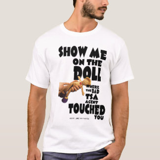 Camiseta Me mostre na boneca onde o agente mau de TSA…