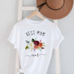 Camiseta Melhor Mãe Nunca | Trendy Burgundy Boho Floral<br><div class="desc">Esta moda e na moda diz "a melhor mãe de todos os tempos" em um roteiro rústico e manuscrito e apresenta um buquê de aquarelas de flores boho em tons de marsala,  laranja e branco para um presente que sua mãe vai amar.</div>