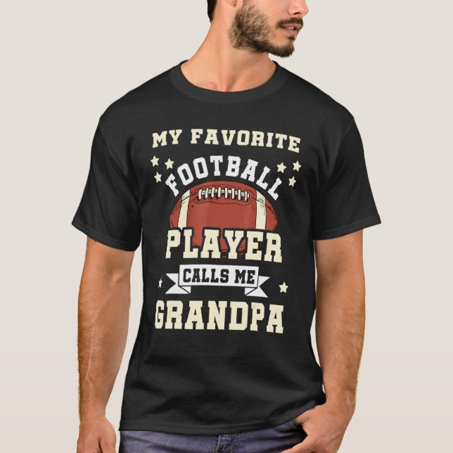 Camiseta Mens Meu Jogador De Futebol Favorito Me Chama Avô (Frente)