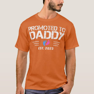 Camiseta Mens promovidos ao Pai Est 2023 cor-de-rosa ou azu