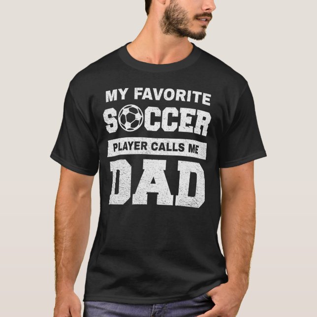 Camiseta Meu jogador de futebol favorito me chama de pai (Frente)