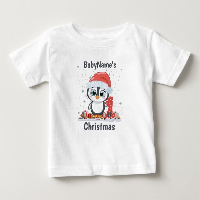 Camiseta Meu Primeiro Natal com presentes de pinguim boniti (Frente)