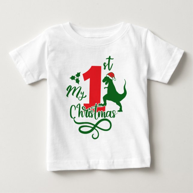 Camiseta Meu Primeiro Natal Dinossauro Bonito Dino (Frente)