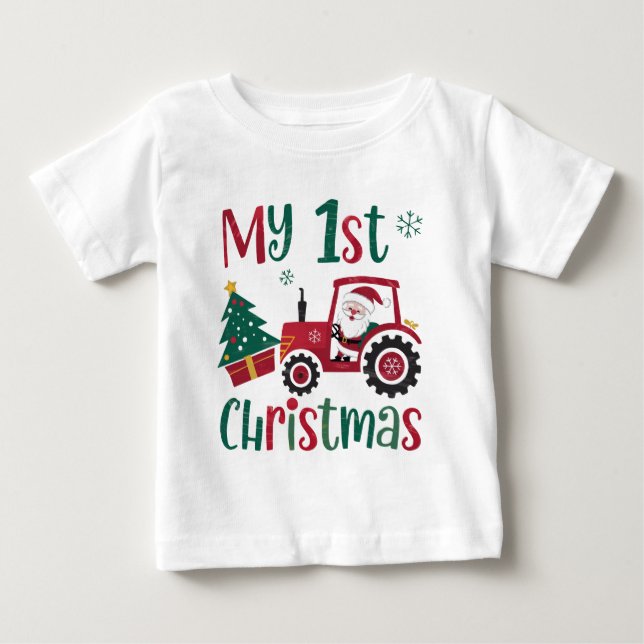 Camiseta Meu Primeiro Natal Trator do Papai Noel Bonito Faz (Frente)