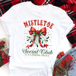 Camiseta Mistletoe Social Club Coquette Christmas<br><div class="desc">Celebre a temporada de férias no estilo Coquette com esta design de Natal do Mistletoe Social Club inspirada na vintagem. O delicado arco misterioso e a tipografia lúdica trazem um talento festivo e feminino, perfeito para quem ama uma mistura de nostalgia e elegância. Quer você esteja participando de uma reunião...</div>