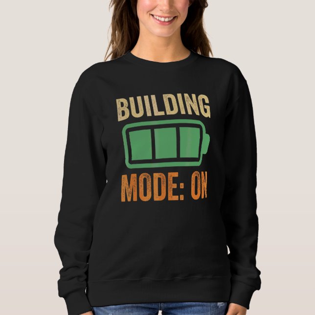 Camiseta Modo de Construção na Bateria de Projeto (Frente)