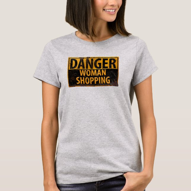 Camiseta Mulher PERIGOSA Comprando - Sinal de aviso de meta (Frente)