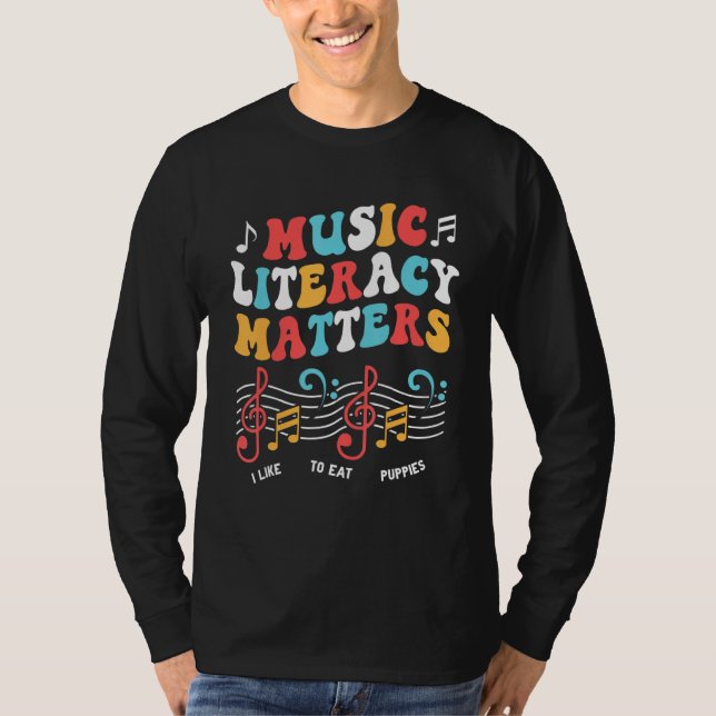 Camiseta Music Literacy Matters I Like to Eat Puppies  Musi (Frente)