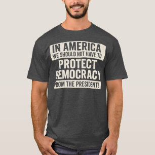 CAMISETA NA AMÉRICA NÃO DEVEMOS TER DE PROTEGER A DEMOCRACI