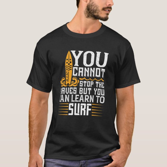 Camiseta Não É Possível Parar As Ondas, Mas Pode Aprender A (Frente)