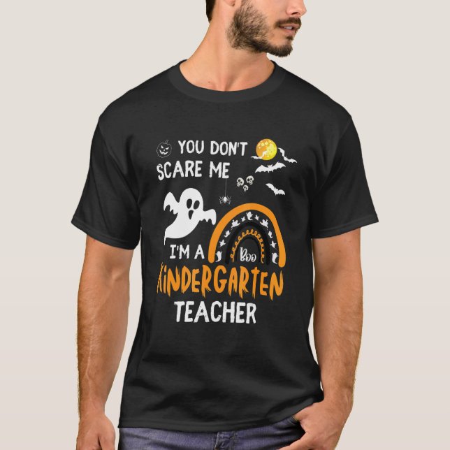Camiseta Não me assusta, sou o professor do jardim de infân (Frente)