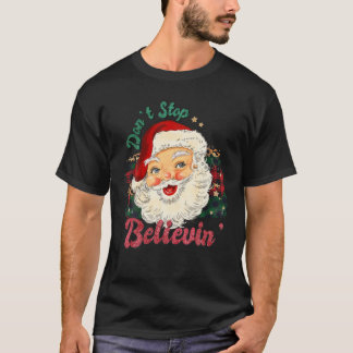 Camiseta Não pare de acreditar em Papais noeis de Natal