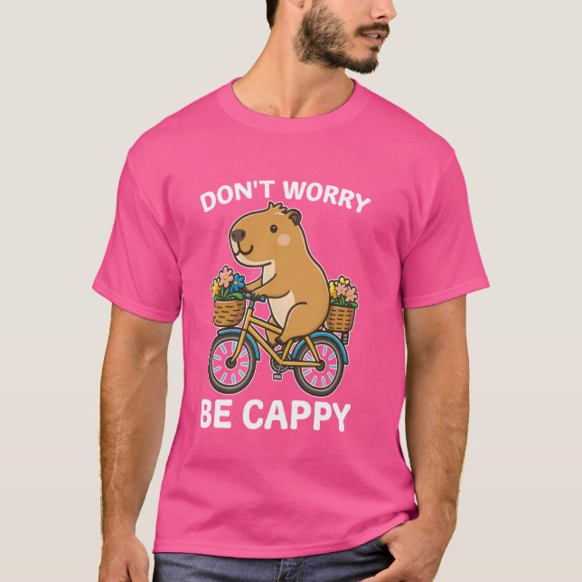 Camiseta Não se preocupe com Cappy Capybara em uma Biciclet (Frente)