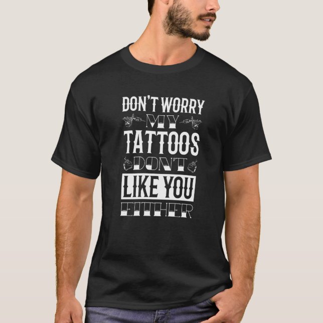 Camiseta Não se preocupe, minhas tatuagens não gostam de vo (Frente)