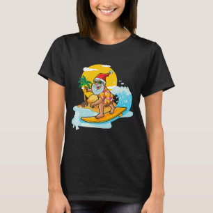 Camiseta Natal em Papais noeis de julho surfando verão Aloh