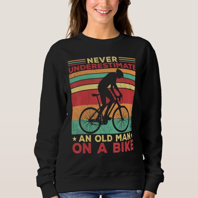Camiseta Never Underestimate an Old Man on a Bike apparel V (Frente)