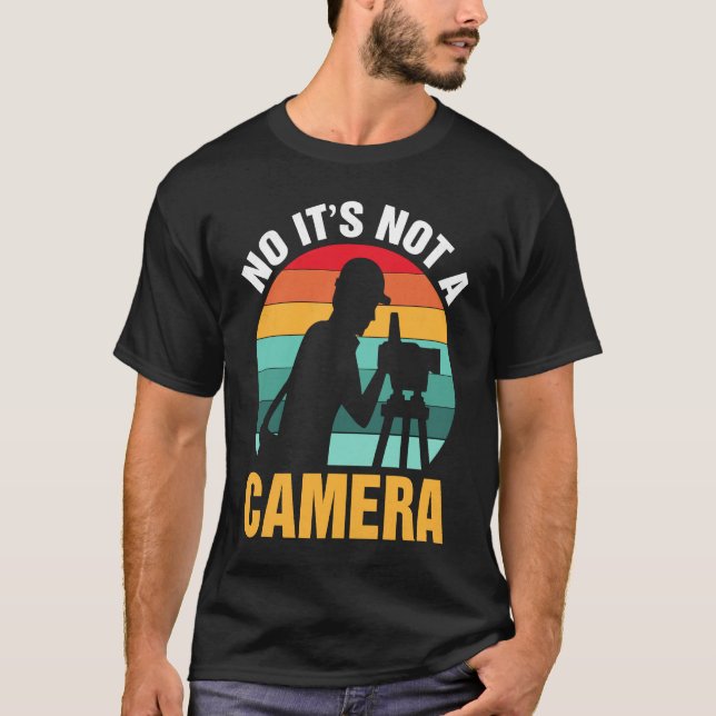 Camiseta No It's Not A Camera  Surveyor (Frente)