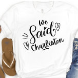 Camiseta Nós Dissemos Charleston Funny Bachelorette White<br><div class="desc">Um design moderno bonito para a festa de casamento ou para uma solteira se livrar. As palavras irrisórias" Dissemos Charleston" em uma tenda preta,  tem coração e certamente será notado. Destino da festa de solteira... Charleston SC,  pode ser vestido para janto de ensaio e com sua festa de casamento.</div>