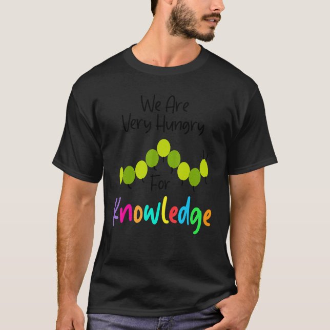 Camiseta Nós Temos Fome de Conhecimento   Lagarta de Volta  (Frente)