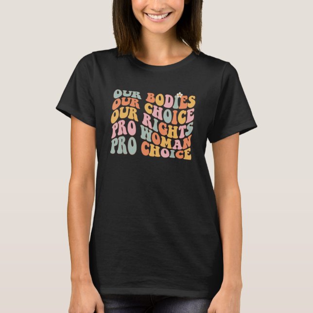 Camiseta Nossos corpos Nossa Escolha Nossos Direitos Pró Es (Frente)