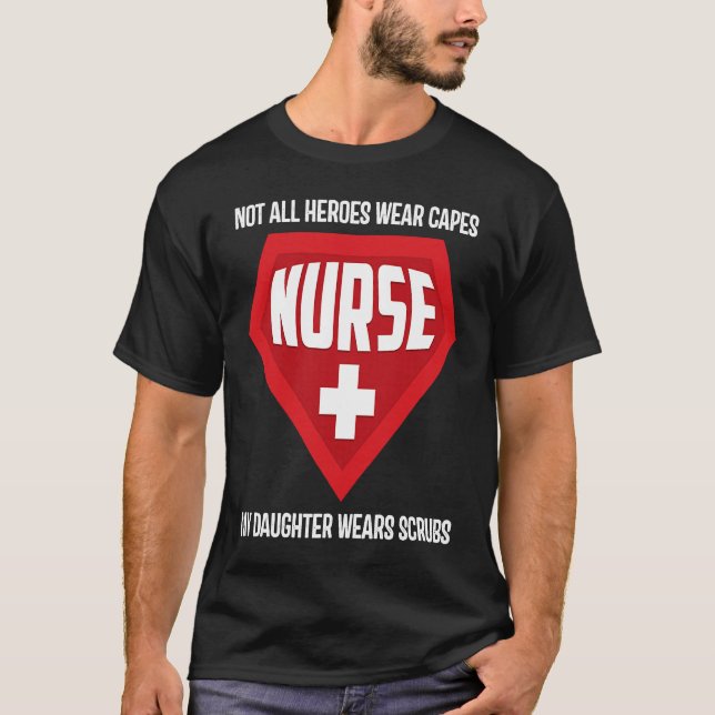 Camiseta Not All Heroes Wear Capes My Daughter Wears Scrubs (Frente)
