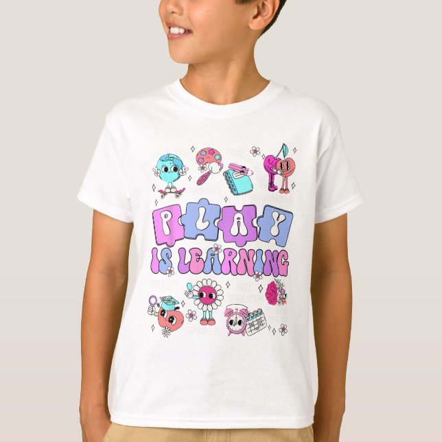 Camiseta O Brincar é Aprender Professor Primeiro Dia De Aul (Frente)