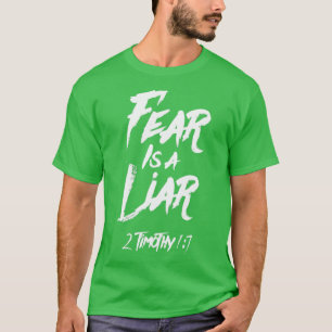 Camiseta O medo é um mentiroso do texto branco Timothy 17