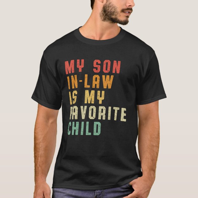 Camiseta O Meu Filho De Direito É A Minha Filha Favorita Qu (Frente)