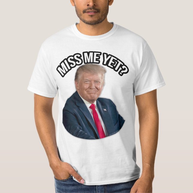 Camiseta O Presidente Donald J. Trump Sente Minha Falta Ain (Frente)