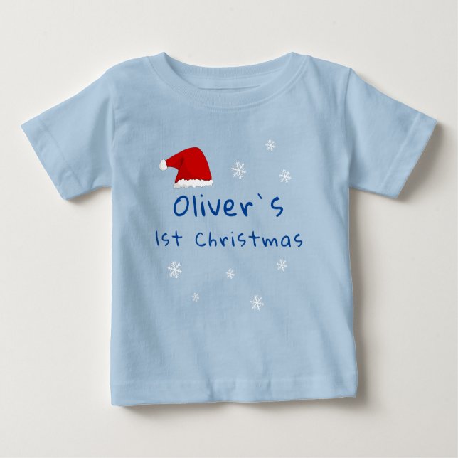 Camiseta O Primeiro Natal do Papai Noel Floco de Neve Azul (Frente)