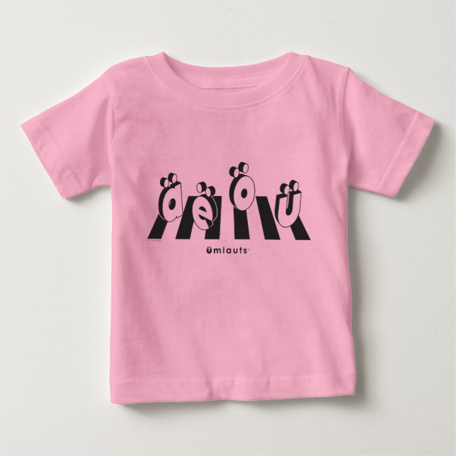 Camiseta “Os Umlauts™ Cruzando” (Frente)