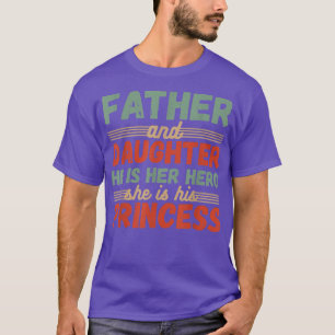 Camiseta Pai e Filha Ele é o Herói. Ela é sua Prin