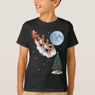Camiseta Papai Noel engraçado montando cachorro pastor alem