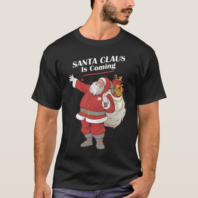 Camiseta Papai Noel Está Chegando Papais noeis Engraçados P (Frente)