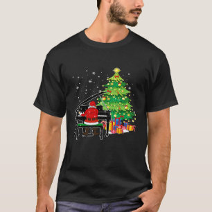 Camiseta Papai Noel Joga Piano Perto da Árvore de Natal Eng