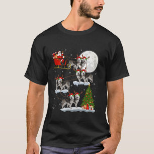 Camiseta Papais noeis De Luz Xmas Andando No Alaskan Malamu