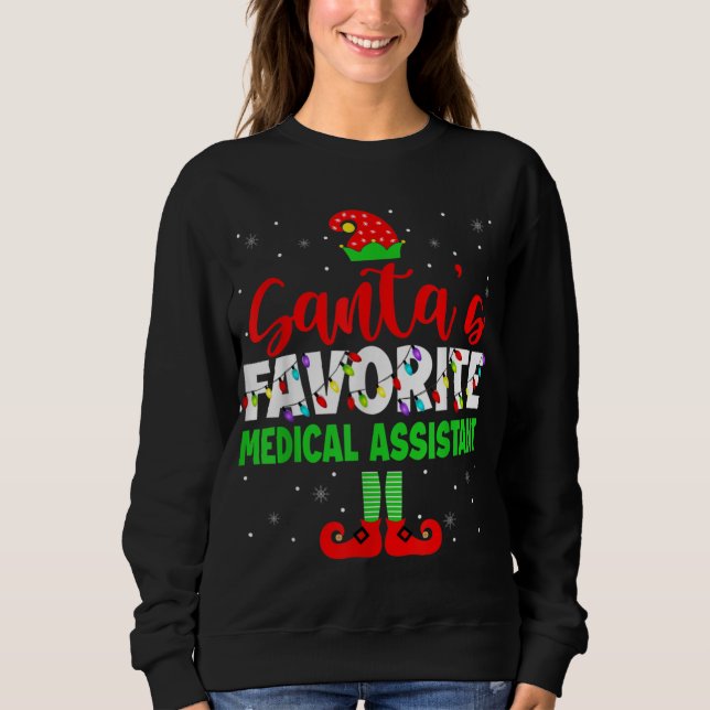 Camiseta Papais noeis Favoritos Assistente médico Luz de Na (Frente)