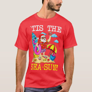 Camiseta Papais noeis Flamingo Float Este é o Natal do SeaS