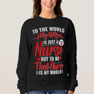 Camiseta Para o Mundo Minha Esposa É uma Enfermeira Mas Par