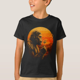 Camiseta Pé-grande soprando dandelion pôr do sol floresta r